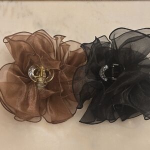 NWT Free People Large Claw Bow Clips. 1 Black and 1 Bronze/Brown